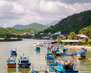 boats-in-vietnams-river-beautiful-landscape-with-islands-and-water_121355-851